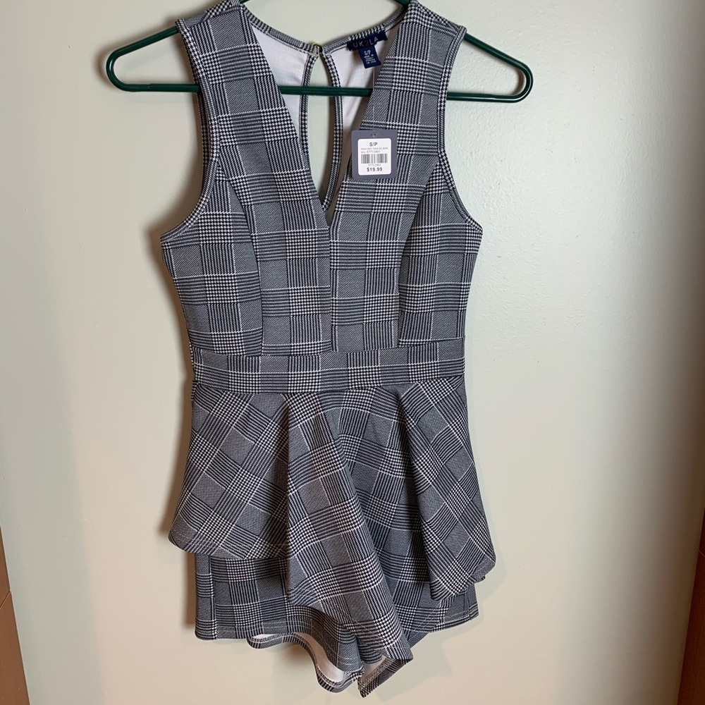 Brand new cute romper with tags!